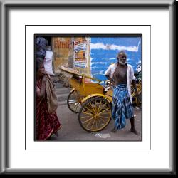 older man,India woman, rickshaw, pedicab